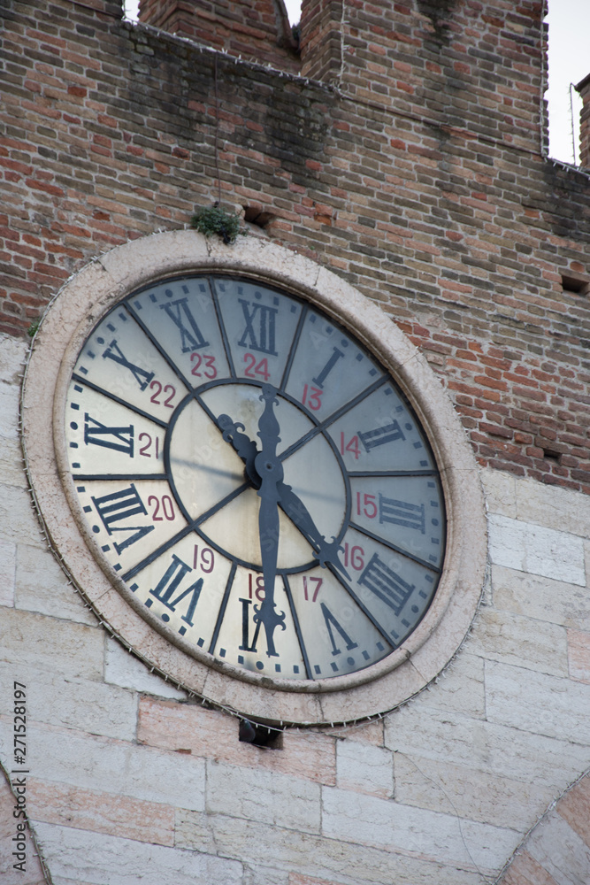 Verona Clock ,Corso Porta Nuova street and medieval Gates Portoni della Bra, Verona, Italy,2019