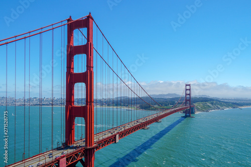 Famous Golden Gate Bridge. Suspension bridge spanning the Golden Gate. The structure links the American city of San Francisco, California, the northern tip of the San Francisco Peninsula to Marin C