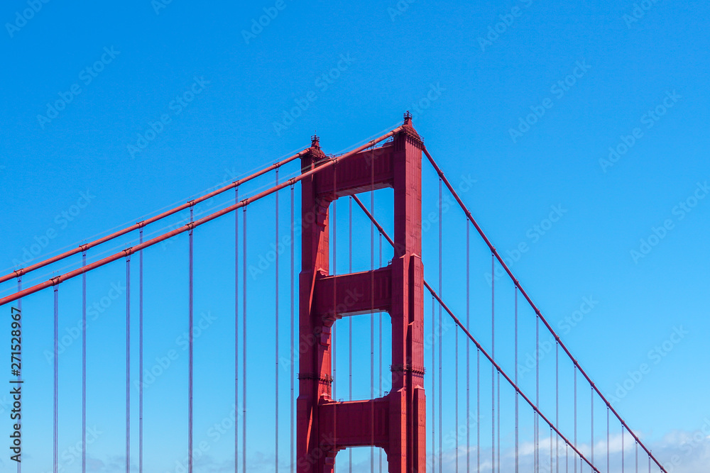 Fototapeta premium Famous Golden Gate Bridge. Suspension bridge spanning the Golden Gate. The structure links the American city of San Francisco, California – the northern tip of the San Francisco Peninsula – to Marin C