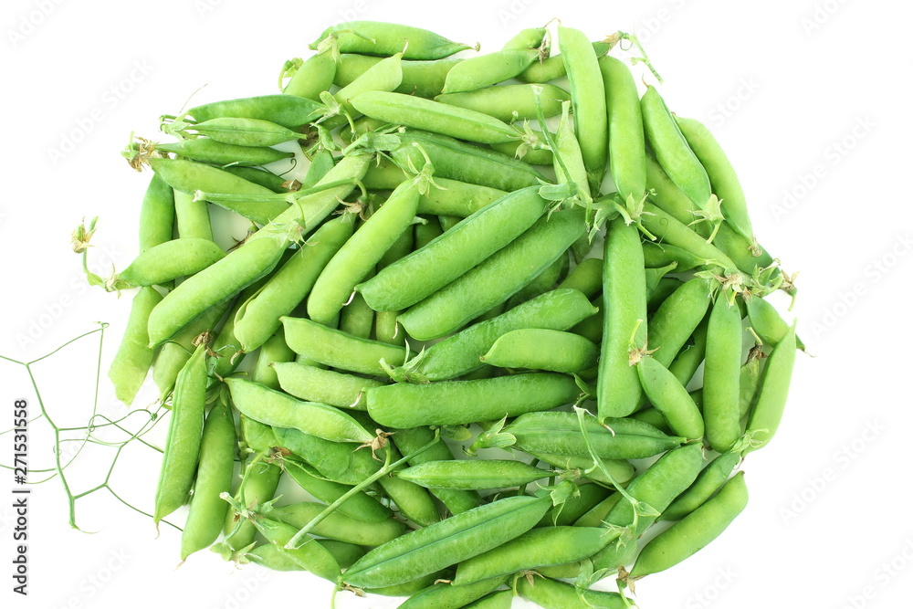 fresh green pea pods and green peas isolated on the white background fresh green pea pods and green peas isolated on the white background