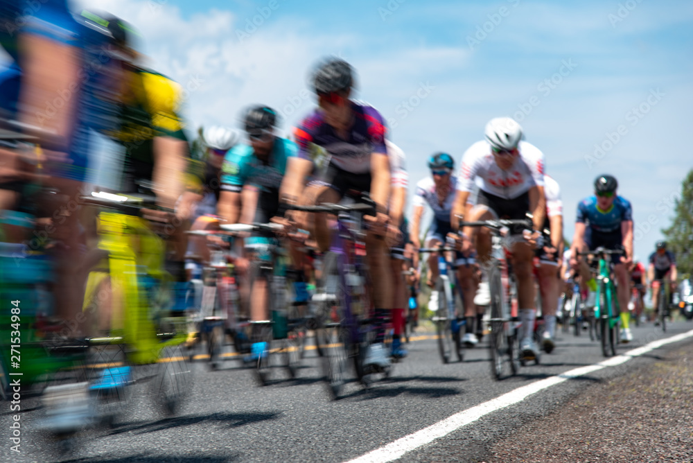 Naklejka premium Road Cyclists in a Race