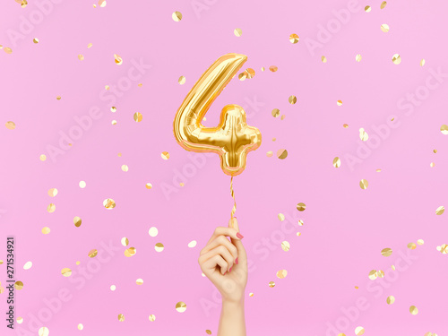 Four year birthday. Female hand holding Number 4 foil balloon. Four-year anniversary background. 3d rendering