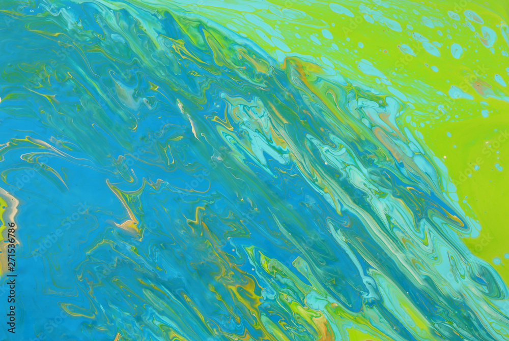 photography of abstract marbleized effect background. Blue, mint and green creative colors. Beautiful paint with the addition of gold.