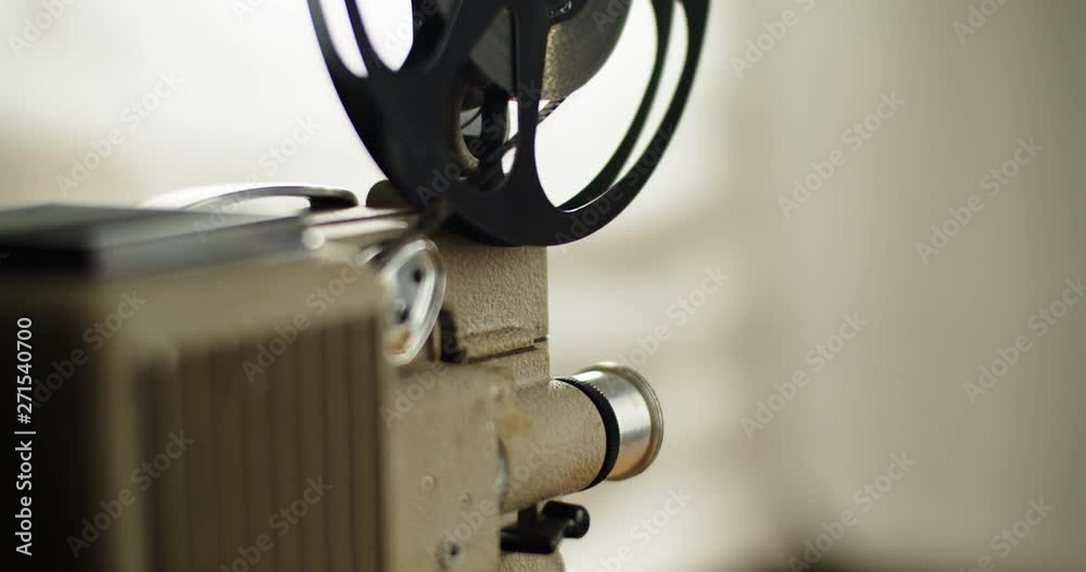 8 mm movie projector Retro is playing. Vintage projector, 4K DCI