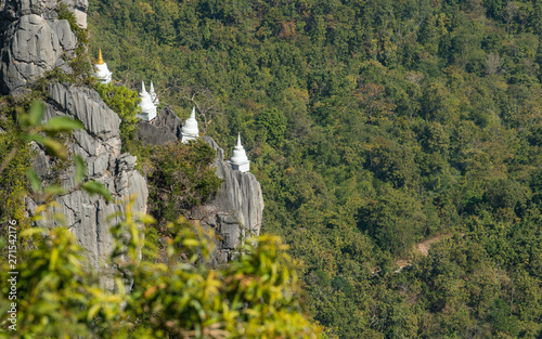 Group of floating pagodas at the mountain edge in temple of Wat Chaloem Phra Kiat, One of the most tourist attraction place in Lampang province of Thailand.