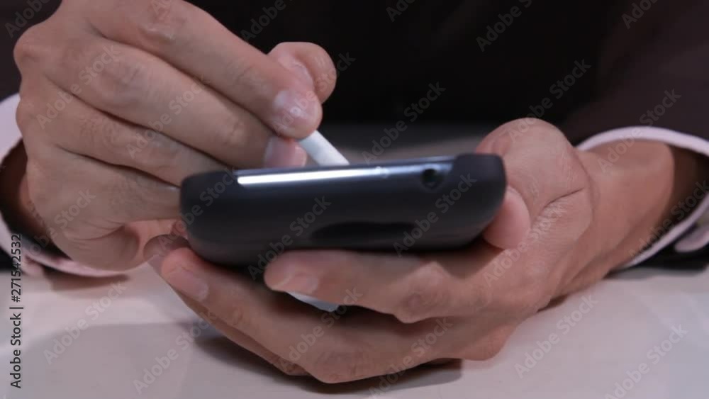 Businessman using PDA mobile phone Businessman using PDA mobile phone