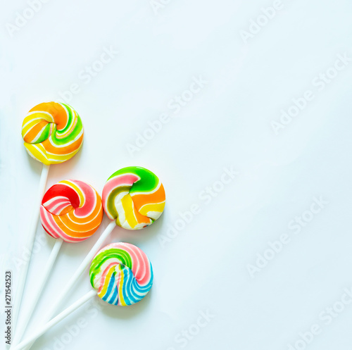 Colorful lollipops on white background. Delicious sweet and childhood concept.