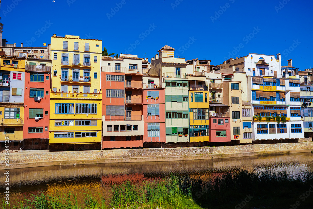 Girona. Colorful houses on the river Onyar. Beautiful town of Girona, Catalonia, Spain Girona. Colorful houses on the river Onyar. Beautiful town of Girona, Catalonia, Spain