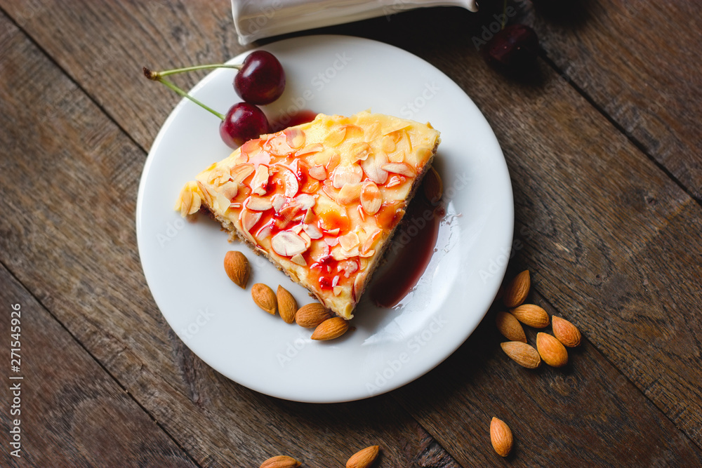 Almond cake, almond cake topped with syrup, sweet sauce of cherries Almond cake, almond cake topped with syrup, sweet sauce of cherries
