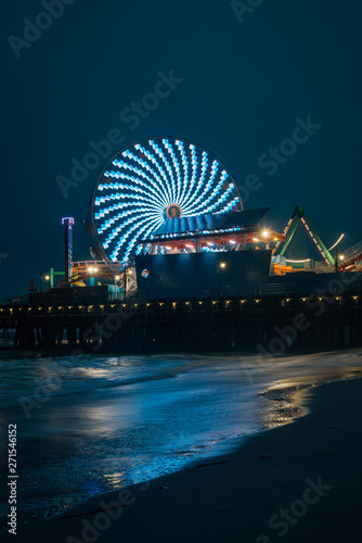 Ferris wheel on the Santa Monica Pier at night, in Santa Monica, Los Angeles, California