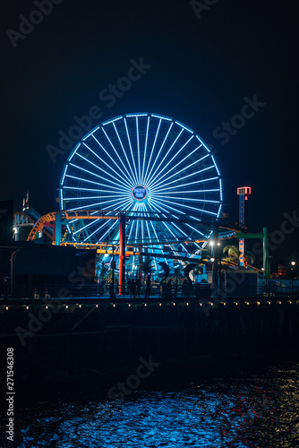 Ferris wheel on the Santa Monica Pier at night, in Santa Monica, Los Angeles, California