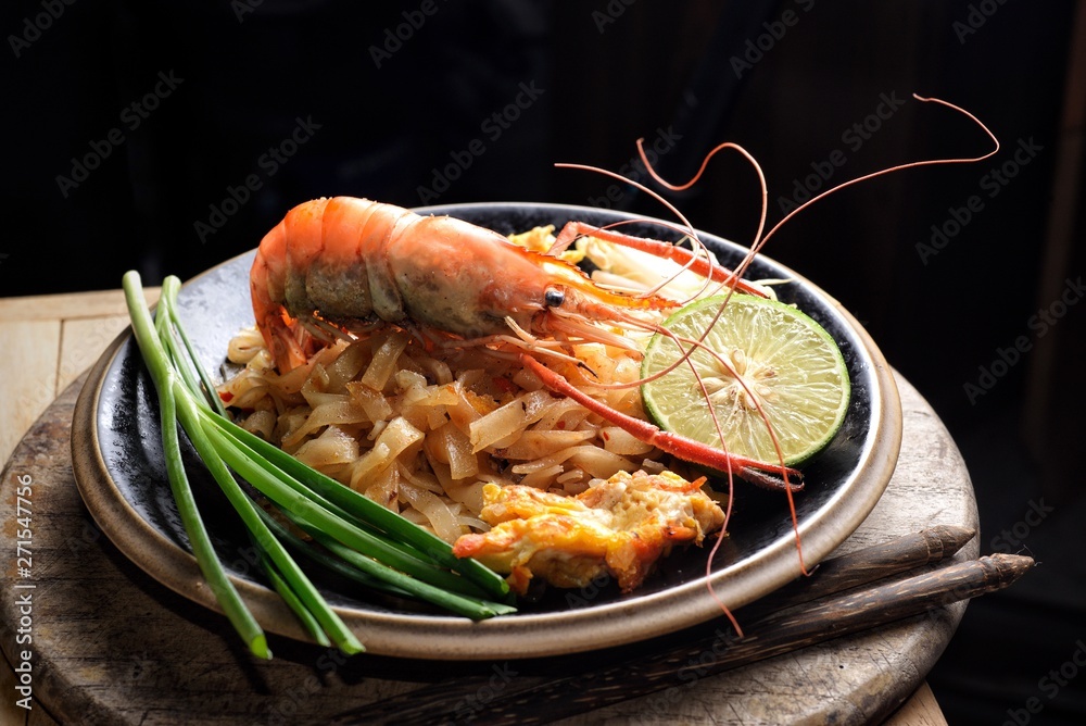 Pad thai topping with giant freshwater prawn, famously Thai food