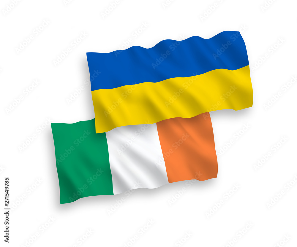 Obraz premium National vector fabric wave flags of Ireland and Ukraine isolated on white background. 1 to 2 proportion.