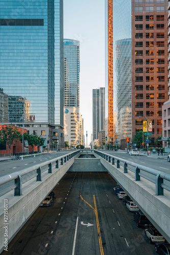 Cityscape view of underpass on Grand Avenue and modern buildings in downtown Los Angeles  California