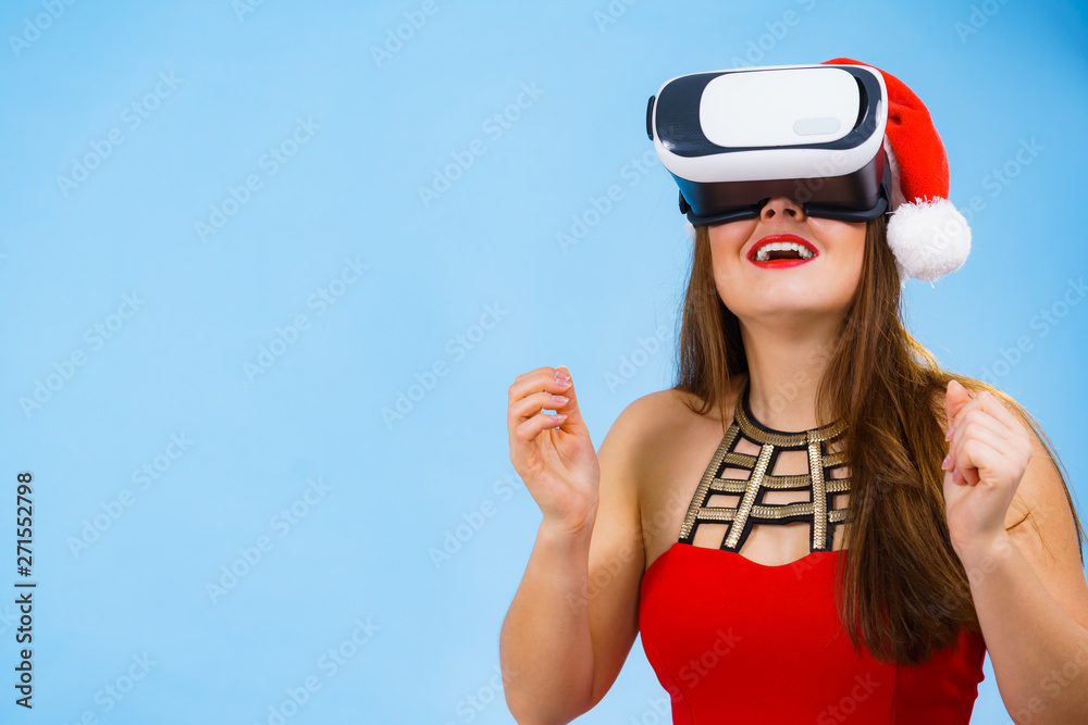 Girl watching 3d film tour in virtual reality glasses.