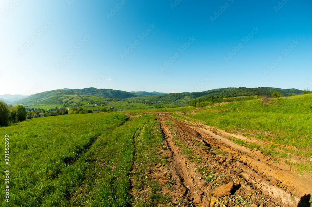 beautiful mountain valleys and mountains on a bright sunny day on the background of a wide valley