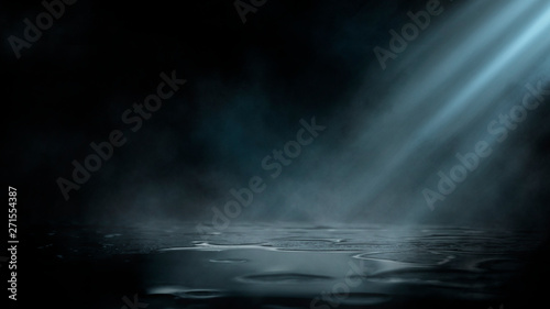 Empty street scene background with abstract spotlights light. Night view of street light reflected on water. Rays through the fog. Smoke  fog  wet asphalt with reflection of lights. 