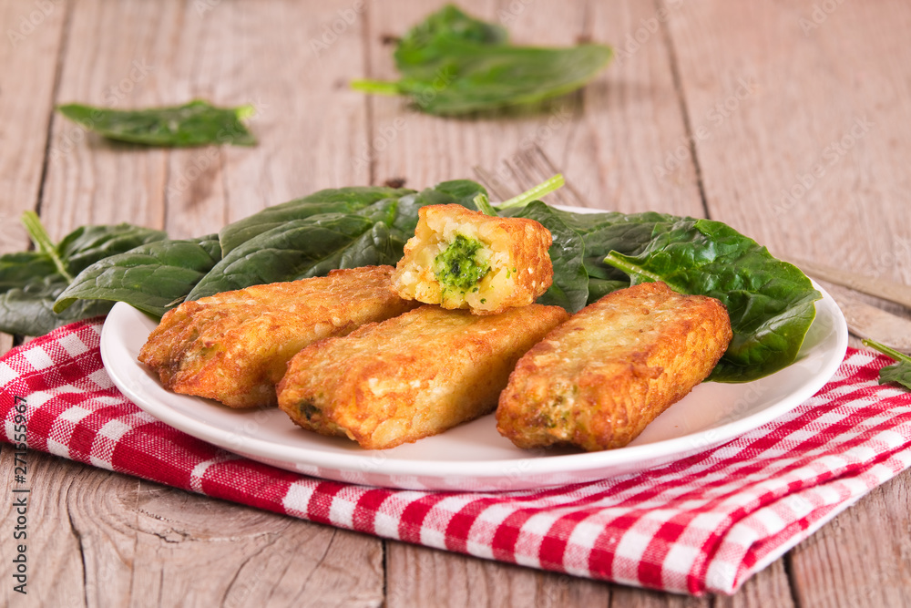 Potato croquettes with spinach and mozzarella. Potato croquettes with spinach and mozzarella.