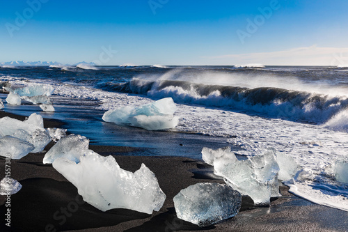 Ice rock with black sand beach at Jokulsarlon beach. Diamond beach in Iceland