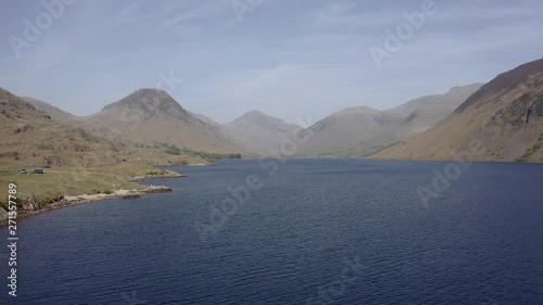 Drone pull back asending shot over Wast Water showing Scarfell Pike and Great Gable in the Lake District, Cumbria photo