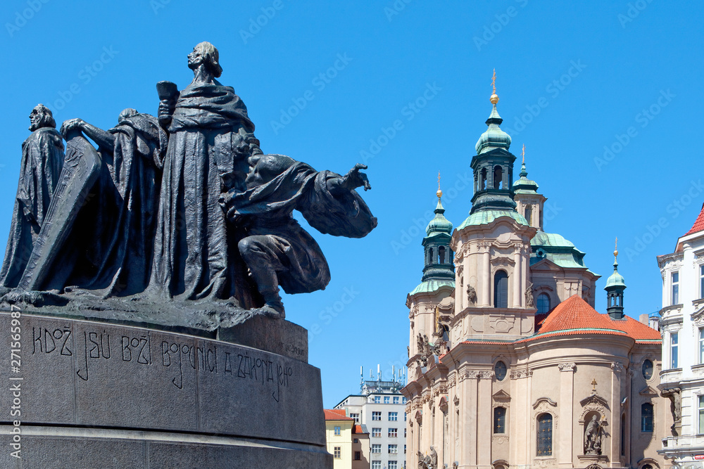 Fototapeta premium Prague - St. Nicolas Church and Jan Hus Memorial at The Old Town