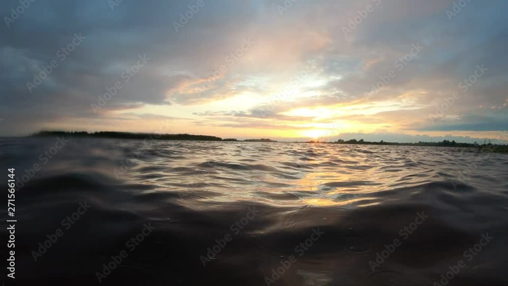 Waves at sunset. The waves at dusk. Waves at sunset. The waves at dusk.