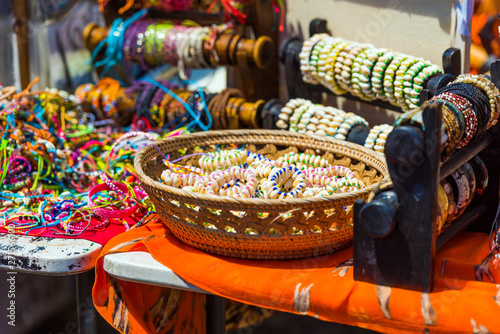 Multi-colored bracelets in the local market, Rarotonga, Aitutaki, Cook Islands. With selective focus.
