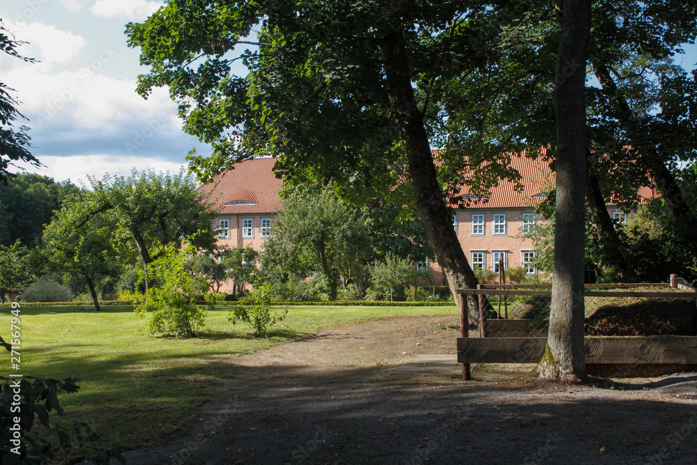 Fototapeta premium Nice garden before an old cloister