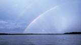 double rainbow over the water