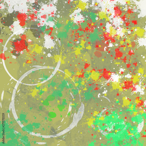Colorful watercolor paint splatters and stains on green background.