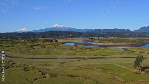 Aerial view of the surroundings of the community of Chamiza in the city of Puerto Montt on a sunny day with few clouds photo