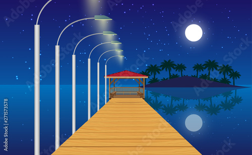 landscape of wooden gazebo at the beach in the night
