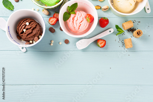 Wallpaper Mural Homemade assorted ice cream on light blue wooden background. Healthy summer food concept. Top view, copy space. Torontodigital.ca