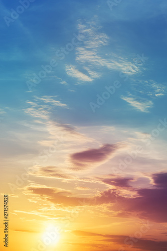 Dramatic colorful sunset or sunrise sky landscape. Natural beautiful dawn background wallpaper. Twilight time cloudscape © Kirill Gorlov