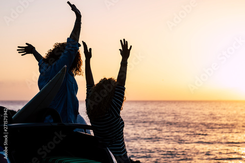 Fototapeta Happiness and successful concept with couple of women young friends enjoy the su