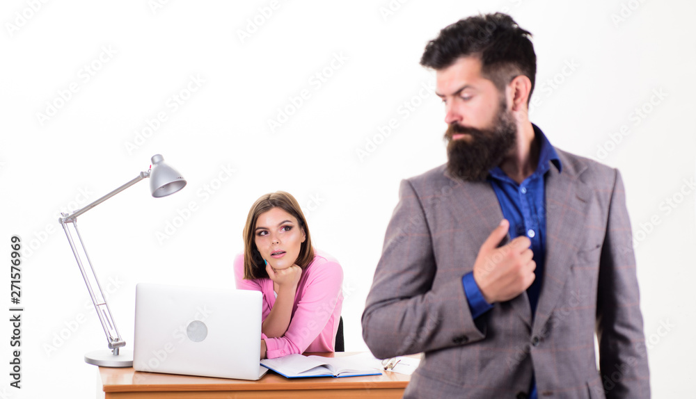 Running her own business. Business lady looking at bearded man in office. Sexy business woman and male employee working together. Pretty woman and bearded man involved in business affairs Running her own business. Business lady looking at bearded man in office. Sexy business woman and male employee working together. Pretty woman and bearded man involved in business affairs