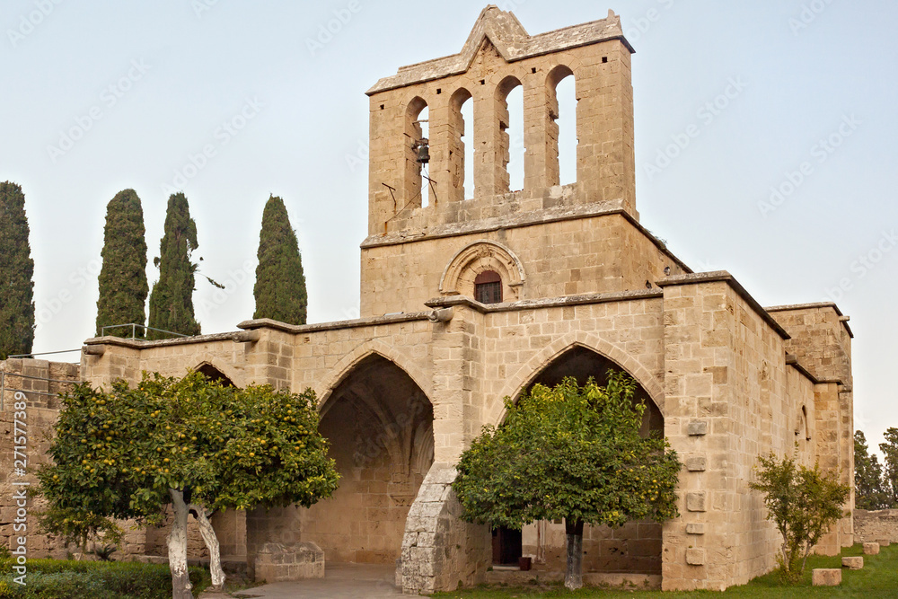 Ruins of the Abbey of Bellapais in the Northern Cyprus. Bellapais Abbey is the ruin of a monastery built by Canons Regular in the 13th century near the Kyrenia.
