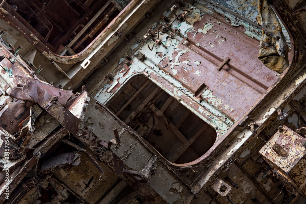 Internal parts of decommissioned marine ship that was cut and left on the shore. Internal parts of decommissioned marine ship that was cut and left on the shore.