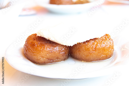 Turkish dessert Kemal Pasa with cream.