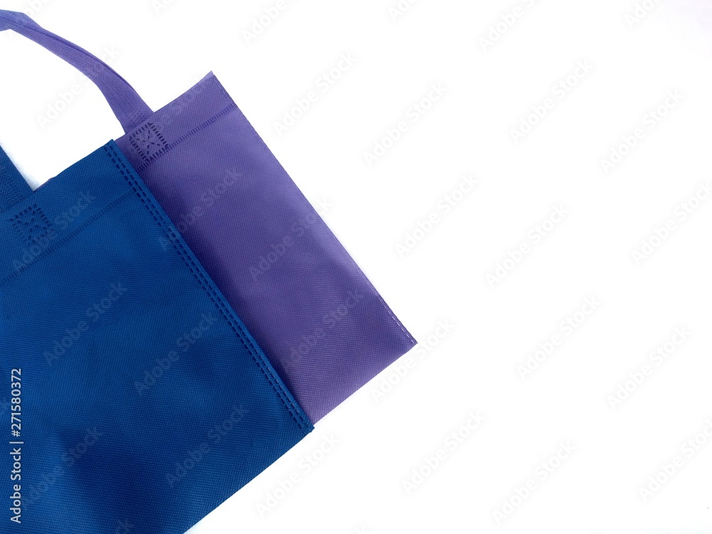 Blue and purple cloth bags .. Popular instead of plastic bags to help reduce global warming and be environmentally friendly. Blue and purple cloth bags .. Popular instead of plastic bags to help reduce global warming and be environmentally friendly.