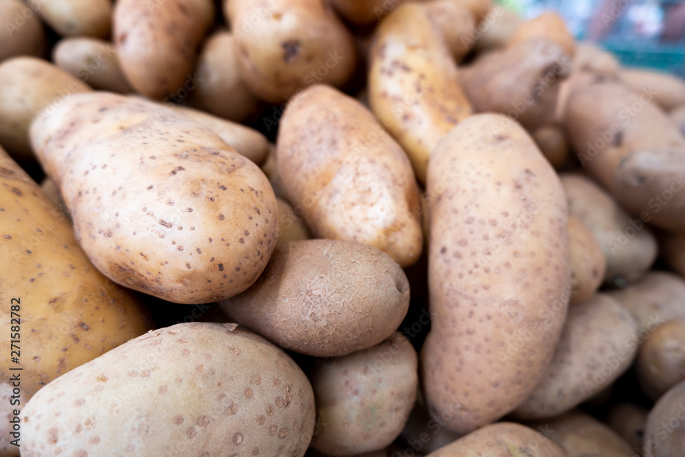 fresh potatos at a market stall, Close up focusl fresh potatos at a market stall, Close up focusl