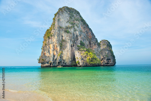 Thailand landscape with tropical sea near sand beach and rock island on foreground and at horizon