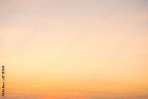 Beautiful cloudscape with orange sky and fluffy clouds at sunset
