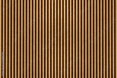 Corrugated card board lines texture. Brown striped pattern backdrop.