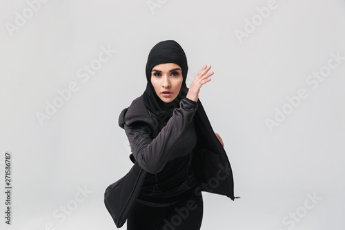 Attractive young muslim woman wearing sport hijab