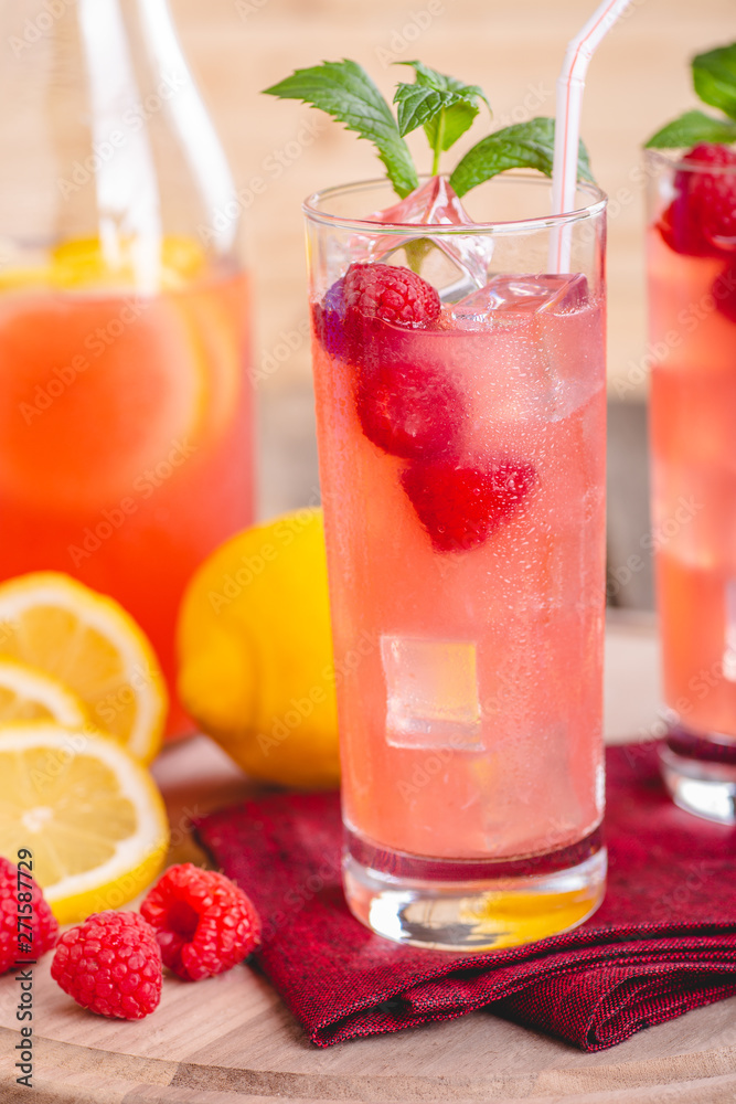 Glass of Raspberry Lemonade With Fresh Berries Glass of Raspberry Lemonade With Fresh Berries