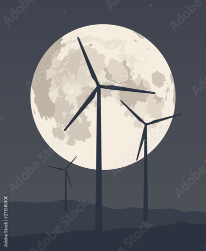 Wind turbine on the background of the night sky and the full moon