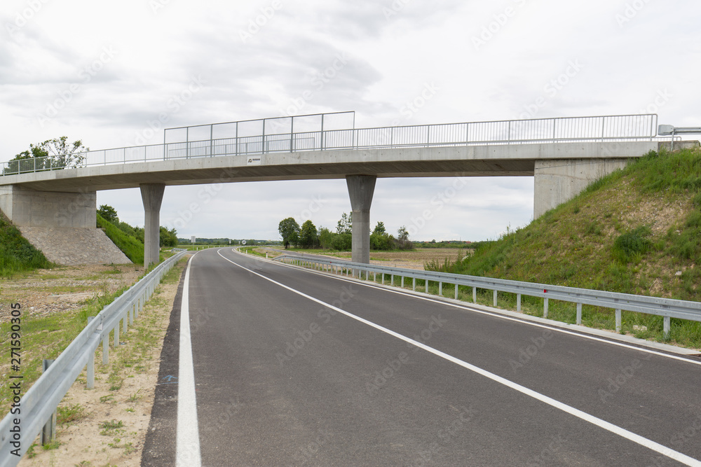 wide angle view of bridge and road