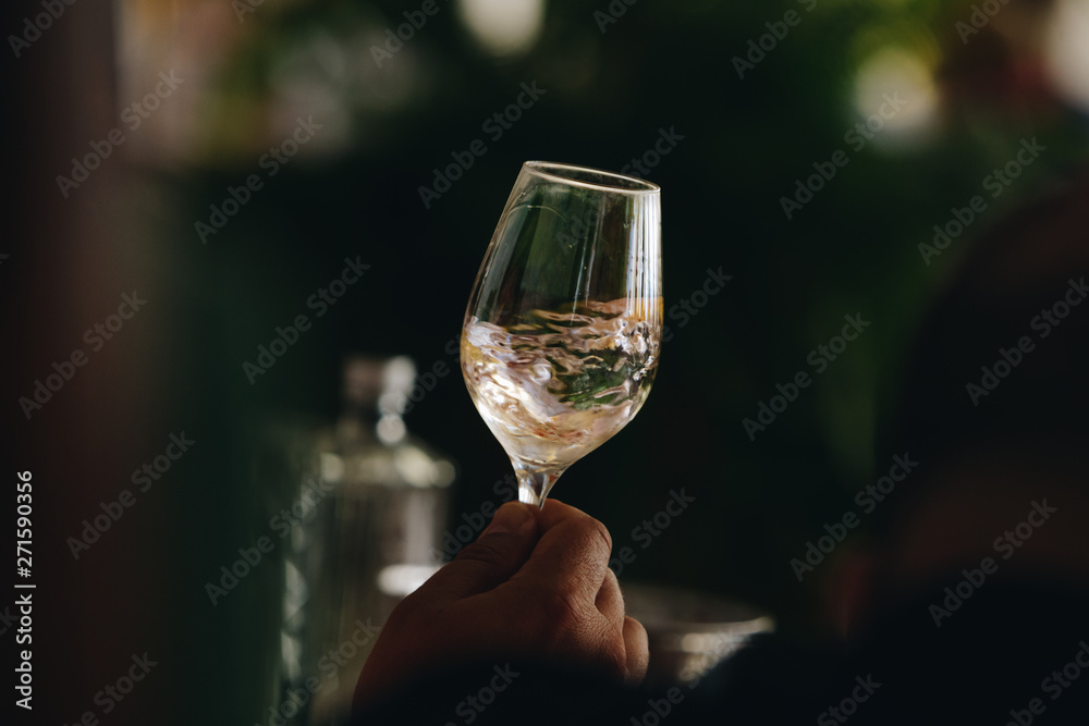 Glass of rose and white wine seen in close hand. Glass of rose and white wine seen in close hand.