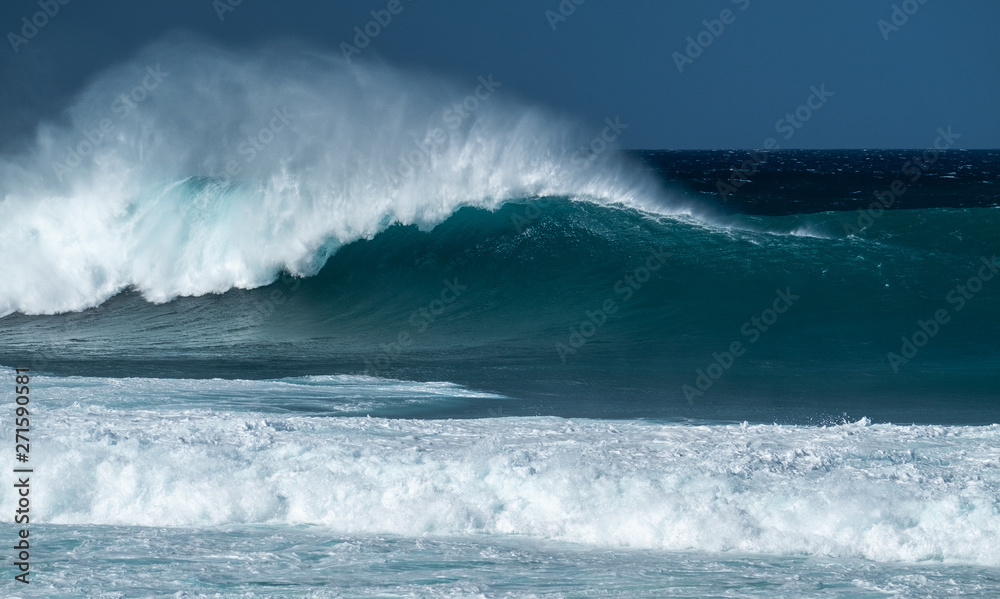 Powerfull wave of the Banzai Pipeline surf spot located on the North Shore of Oahu, Hawaii Powerfull wave of the Banzai Pipeline surf spot located on the North Shore of Oahu, Hawaii